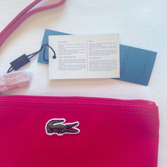 Lacoste Bright Pink Wristlet Clutch NWT 8.25”L x 5”’W - Picture 3 of 4